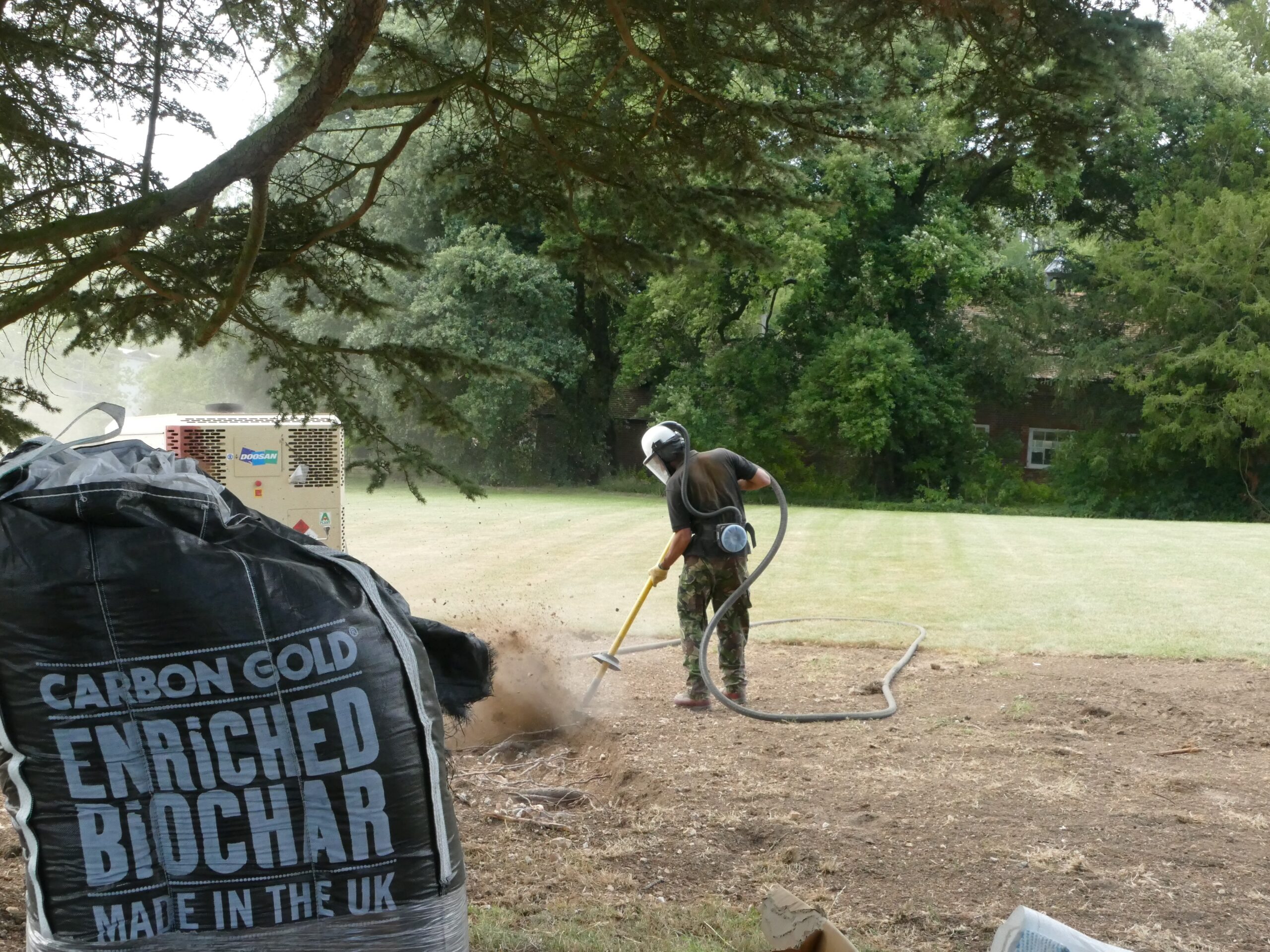 Airspade injection of Carbon Gold biochar into an established tree root zone using the GeoInjector technique